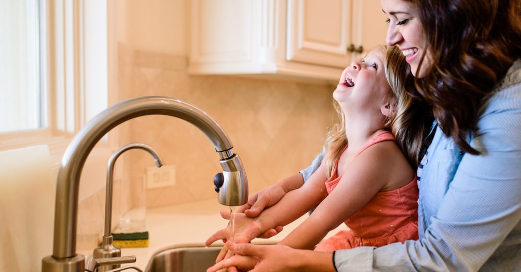 Picture of a Mother and Daughter Washing Hands
