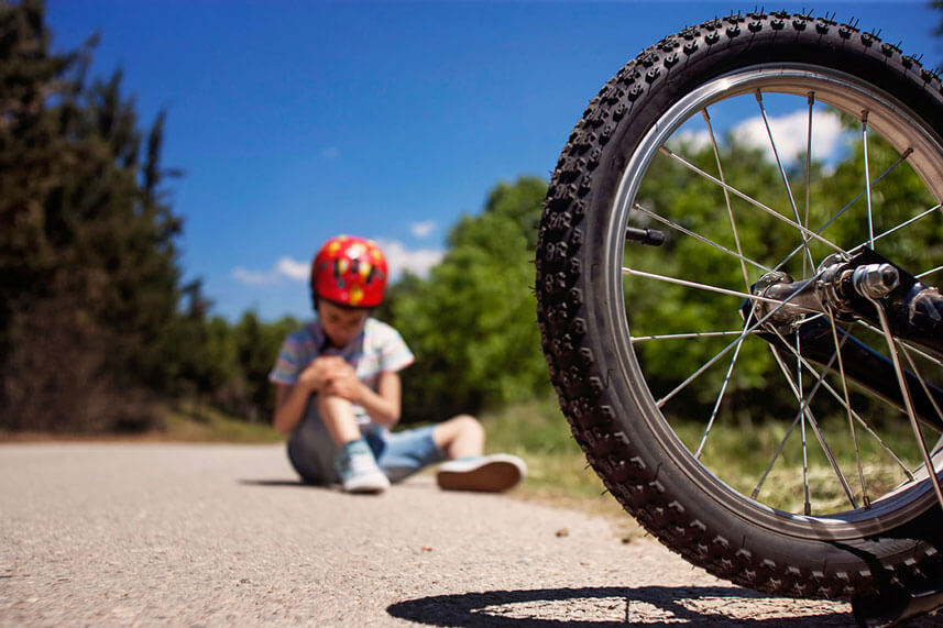 boy with bicycle injury